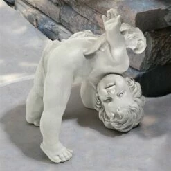 Design Toscano Turvey, The Tumbling Cherub Statue - Off-White