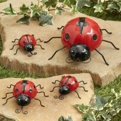 The Lakeside Collection Lakeside Metal Ladybug Garden Decorations with Red and Black Spots - Set of 4