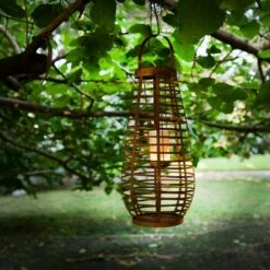 Alpine Corporation Alpine 19" Solar Metal Cylindrical Lantern with Flickering LED Light Brown