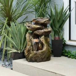 Alpine Corporation 22" Resin Outdoor 4-Teir Rainforest Log Waterfall Fountain with LED Lights Brown