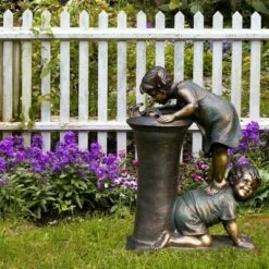 Alpine Corporation 27" Resin Indoor/Outdoor Girl and Boy Drinking Water Fountain Yard Décor Bronze