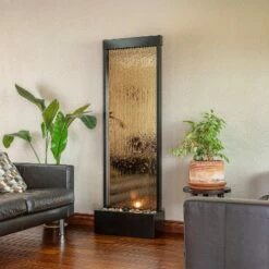 Alpine Corporation 72" Metal Mirror Waterfall Fountain with Stones and Lights Bronze