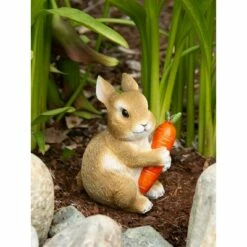 Zingz & Thingz Zingz & Thingz 5" Polyresin Bunny Hugging Carrot Garden Figurine Tan