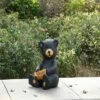 HI-LINE GIFT LTD 13" Polyresin Sitting Bear Cub Holding Sunflower Outdoor Statue Black - Hi-Line Gift -Cheap Garden Decor Store unnamed file 967